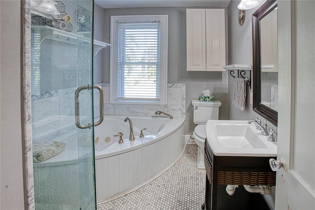 full bathroom with plus walk in shower, tile patterned flooring, vanity, and toilet