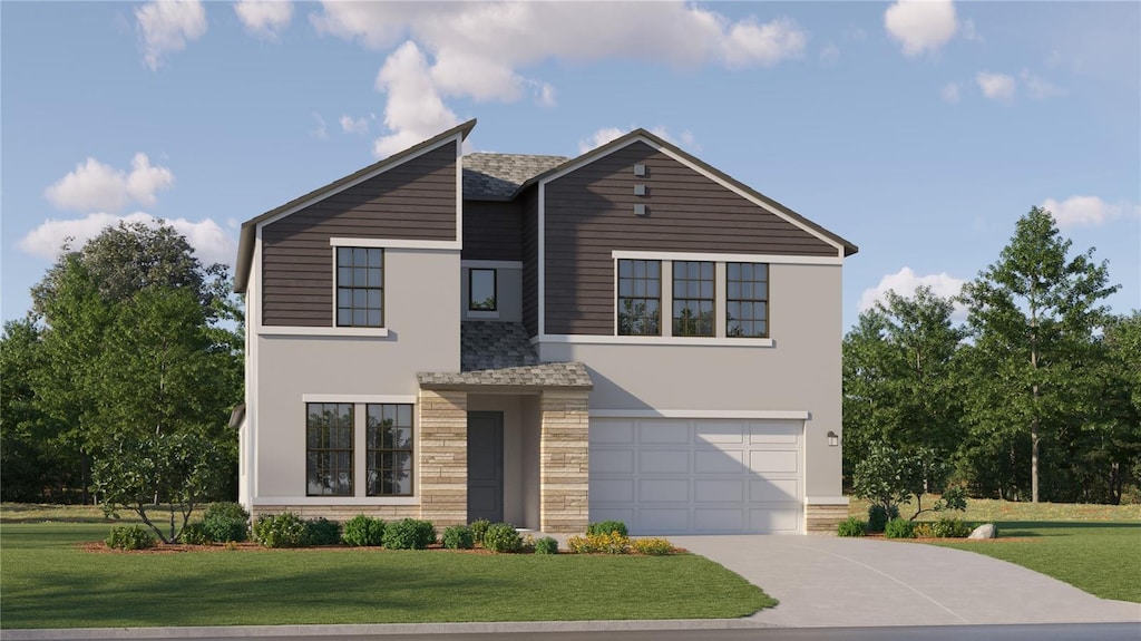 view of front of house featuring a front yard and a garage