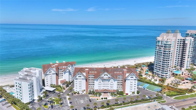 bird's eye view with a beach view and a water view