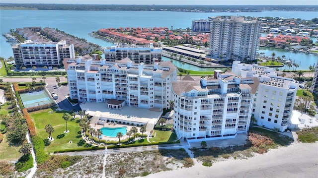 birds eye view of property with a water view