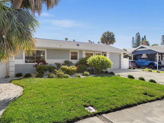 ranch-style house with a front yard and a garage