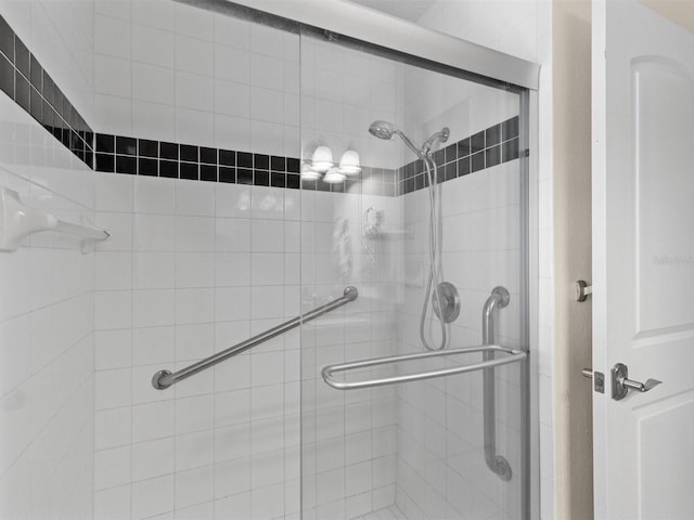 bathroom with an enclosed shower