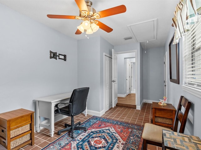 tiled office with ceiling fan