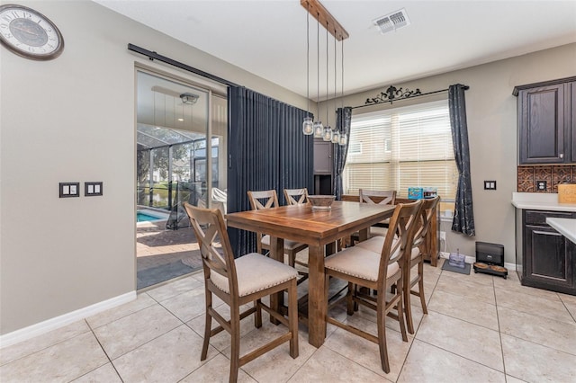 view of tiled dining space