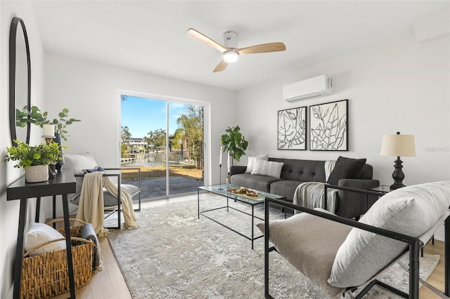 living room featuring an AC wall unit, ceiling fan, and hardwood / wood-style flooring