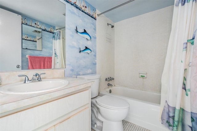 full bathroom with tile patterned flooring, shower / bath combo with shower curtain, vanity, and toilet