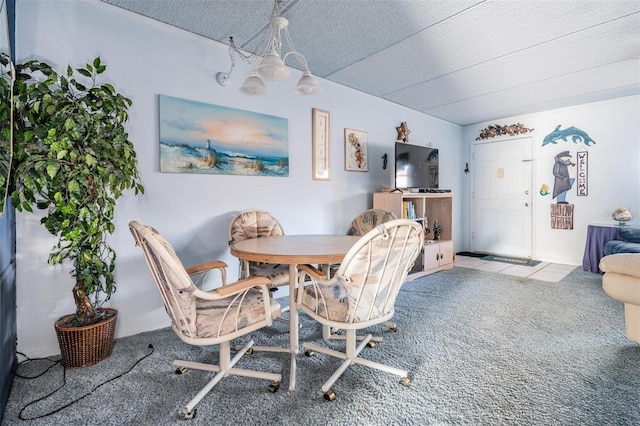 dining room with light carpet