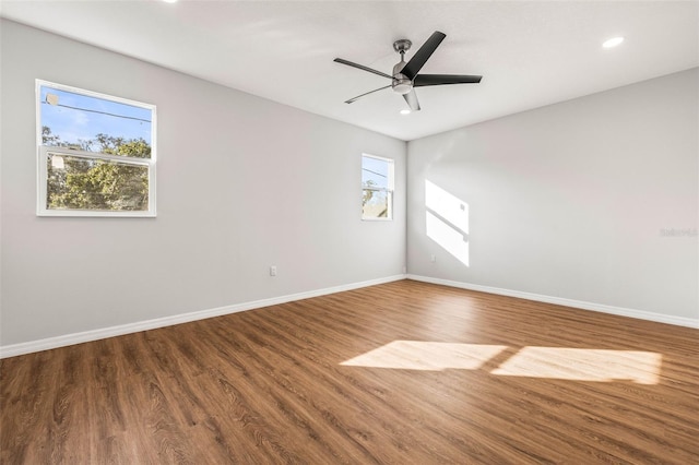 unfurnished room featuring ceiling fan and wood-type flooring