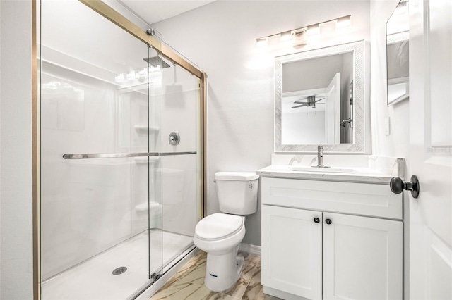 bathroom with vanity, toilet, and walk in shower