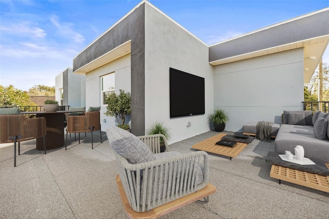 view of patio with an outdoor living space