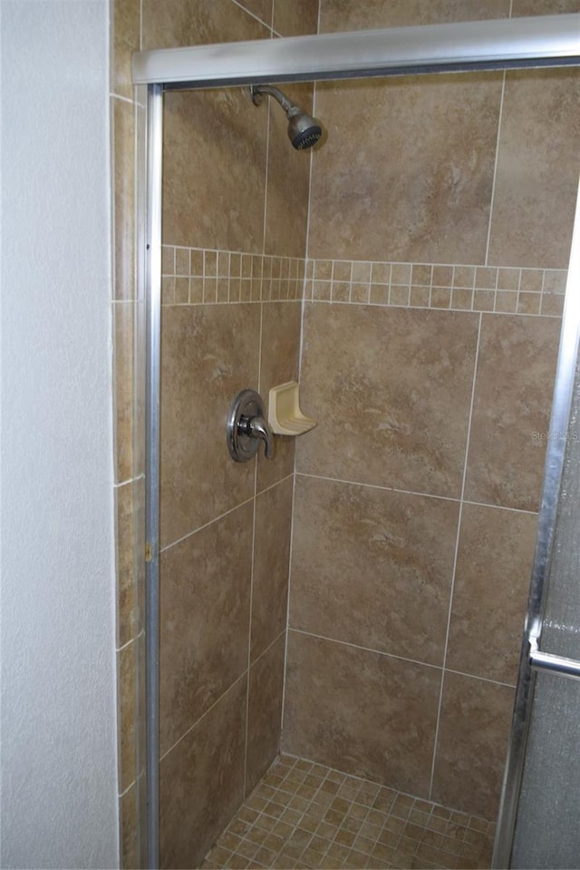 interior space featuring a shower stall