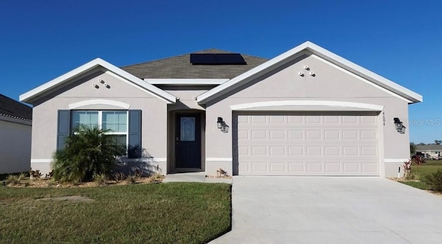 4694 Sigcom Pl, Wildwood, FL 34785 - single story home with a garage, a front yard, and solar panels