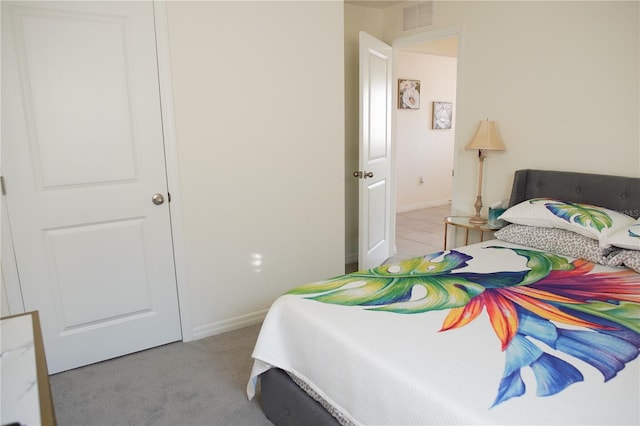 4694 Sigcom Pl, Wildwood, FL 34785 - bedroom featuring baseboards and carpet floors