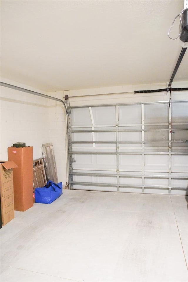4694 Sigcom Pl, Wildwood, FL 34785 - garage featuring a garage door opener