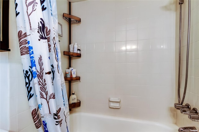 bathroom featuring shower / tub combo with curtain