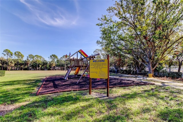 view of play area featuring a lawn