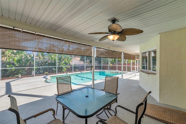 view of pool featuring an in ground hot tub, a lanai, ceiling fan, and a patio area