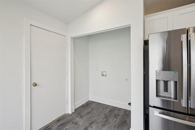 kitchen featuring white cabinets, stainless steel fridge with ice dispenser, dark hardwood / wood-style floors, and lofted ceiling