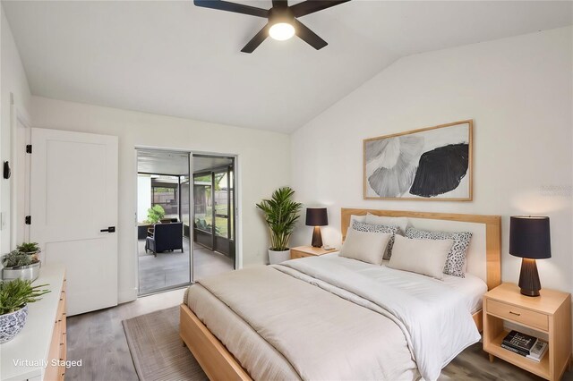 bedroom featuring access to exterior, ceiling fan, light hardwood / wood-style flooring, and vaulted ceiling