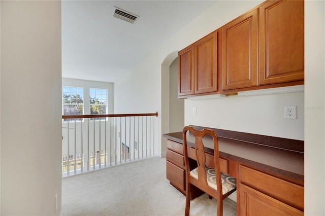 home office featuring light carpet