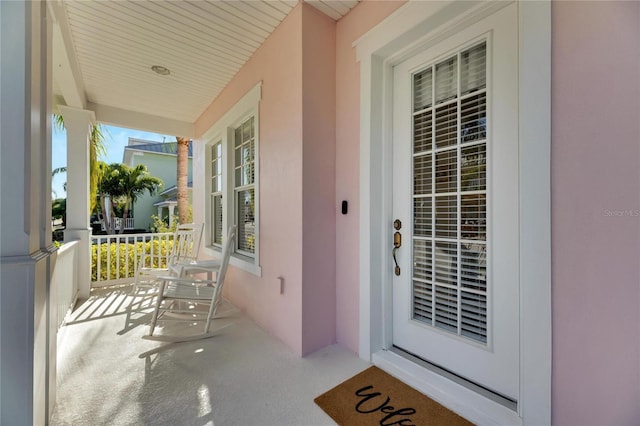 620 Mirabay Blvd, Apollo Beach, FL 33572 - view of exterior entry featuring covered porch and stucco siding