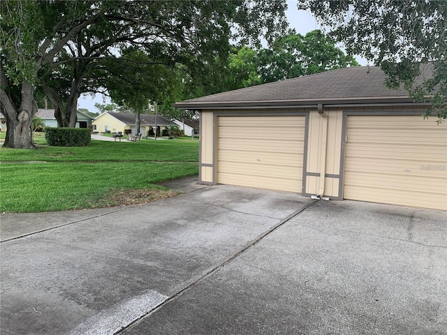 garage with a lawn