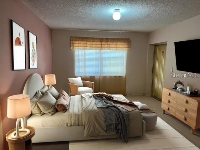 bedroom with a textured ceiling