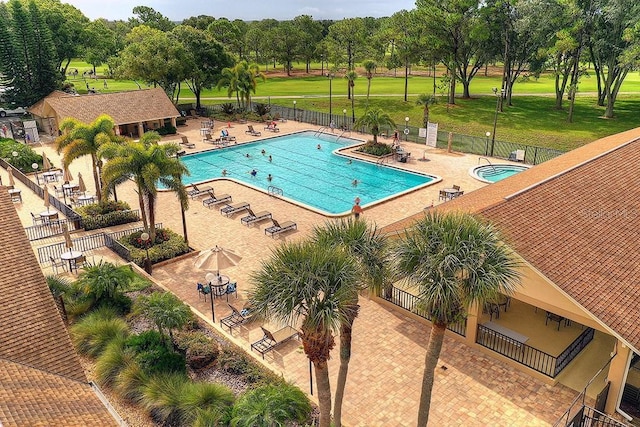 view of swimming pool featuring a patio