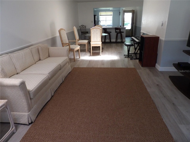 3259 Hilary Cir Unit 1A, Palm Harbor, FL 34684 - living room with wood finished floors and baseboards