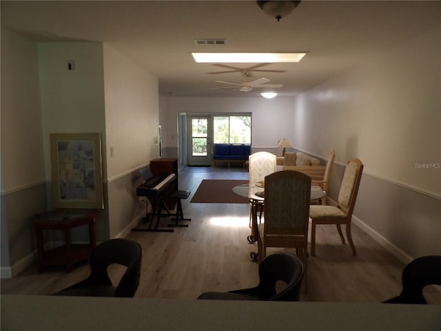 3259 Hilary Cir Unit 1A, Palm Harbor, FL 34684 - dining space with wood finished floors and a ceiling fan