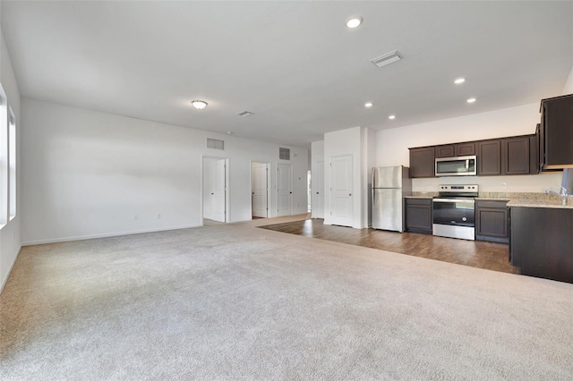 interior space featuring dark colored carpet