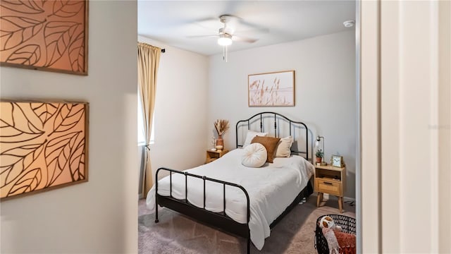 bedroom with ceiling fan and carpet floors