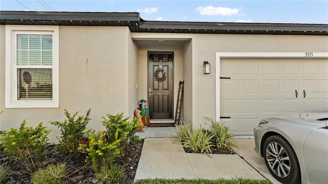 entrance to property with a garage