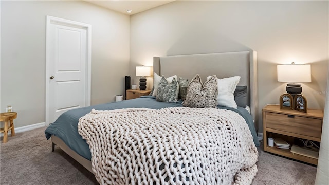 bedroom with dark carpet