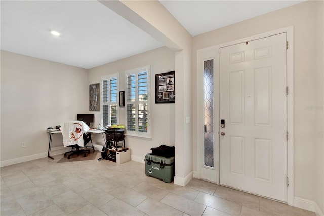 foyer with light tile patterned floors