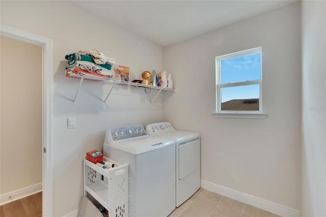 washroom featuring independent washer and dryer