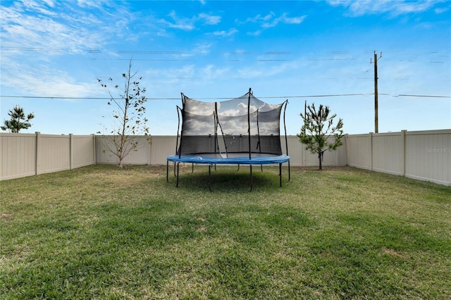 view of yard featuring a trampoline