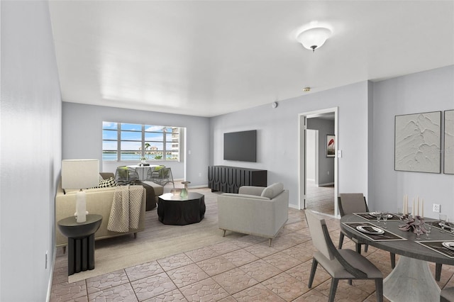 living room featuring light tile patterned flooring