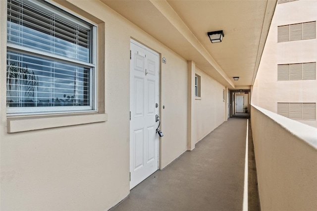 property entrance with a balcony