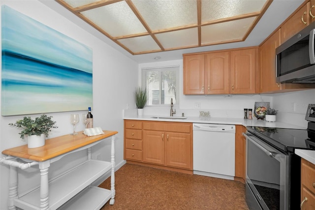 kitchen featuring appliances with stainless steel finishes and sink