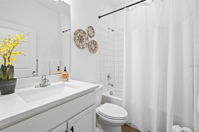 bathroom with vanity, hardwood / wood-style flooring, and toilet