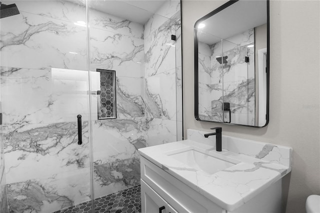 bathroom featuring vanity and walk in shower