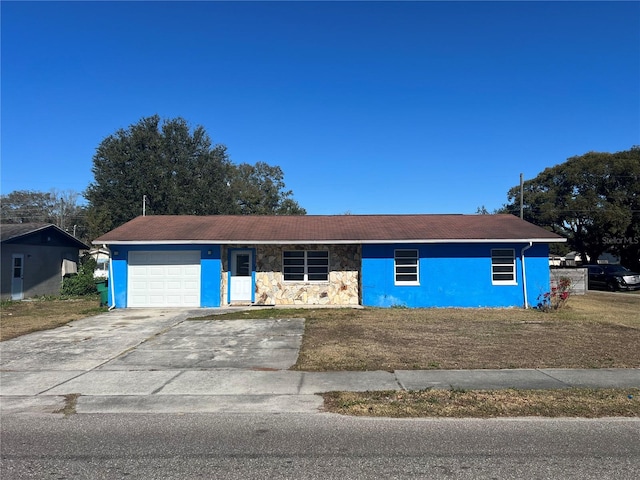 single story home with a garage