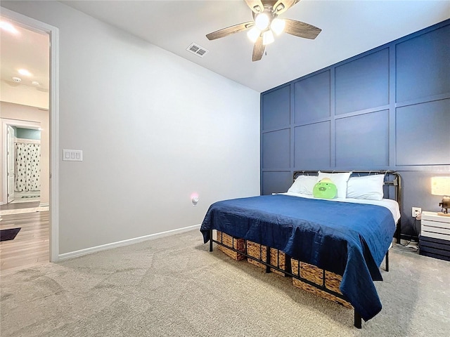 carpeted bedroom with ceiling fan