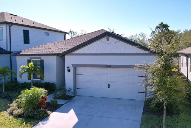 view of front of home with a garage