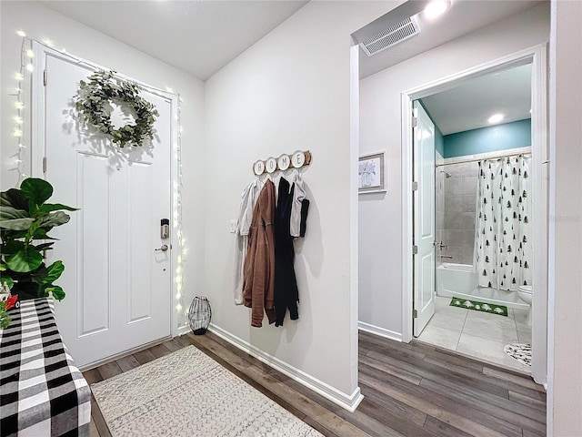 entrance foyer featuring dark hardwood / wood-style flooring