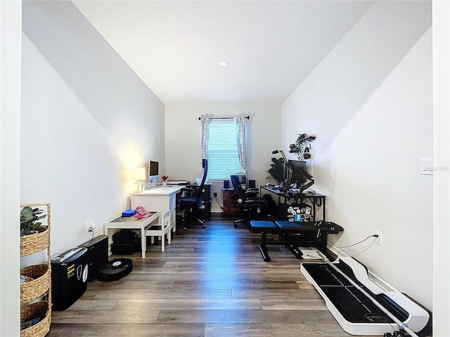 office with dark hardwood / wood-style flooring