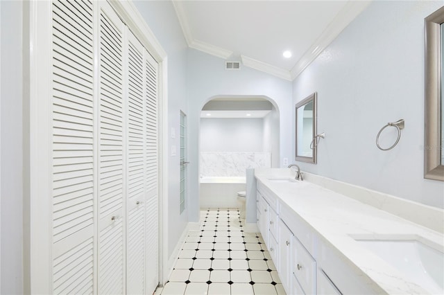 bathroom featuring a bath, lofted ceiling, toilet, vanity, and ornamental molding