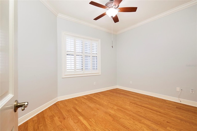 empty room featuring crown molding, ceiling fan, and light hardwood / wood-style floors