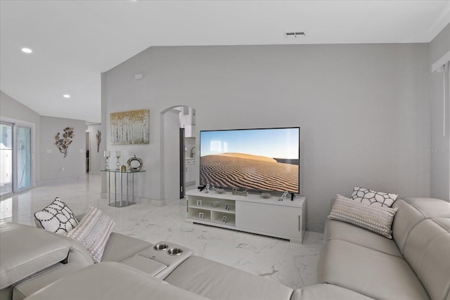 living room with lofted ceiling